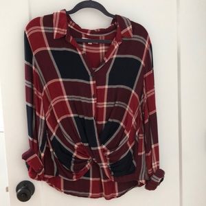 Francesca’s plaid shirt